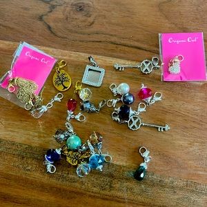 Lot of Origami Owl dangles. New, mint condition. Over 20 dangles.